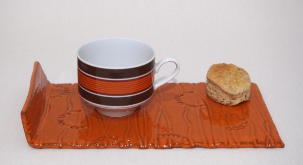 Kaffeetasse Winterling mit orangem Tablett